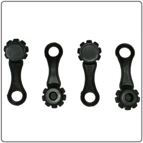It shows a set of four small, round, black plastic caps. Each cap has a screw top and a small hole in the center. These are Phoenix System Bleed Screw Caps, designed to fit on the bleed screws of a car's brake calipers. They help to keep dirt, debris, and rust out of the bleed screws, which can make it difficult to bleed the brakes.